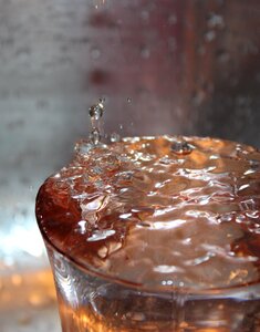 Drop of water drip close up photo