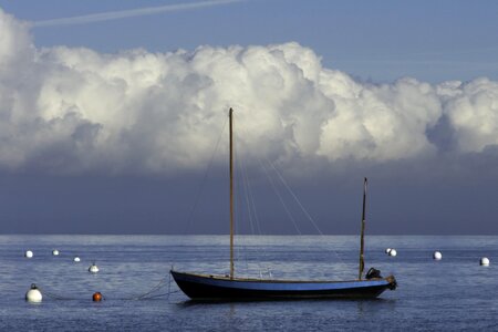 Boat buoys clouds maritime landscape photo