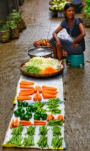 Woman selling vegetables photo