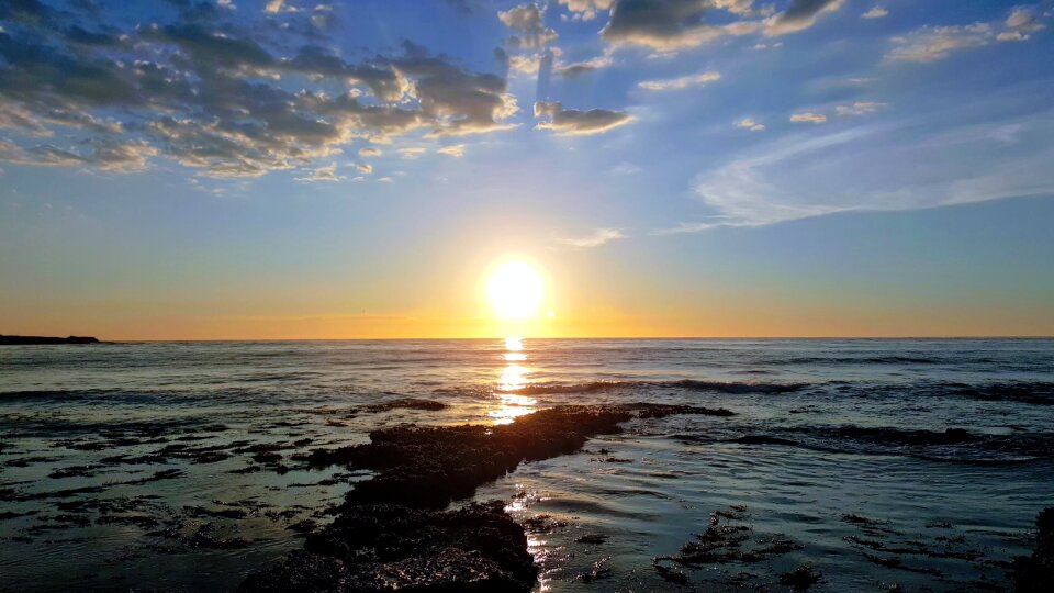 Sun ocean beach sunrise photo