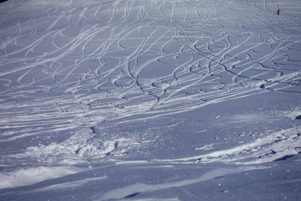 Ski tracks departure deep snow descent