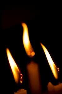 Flammable dark candle photo