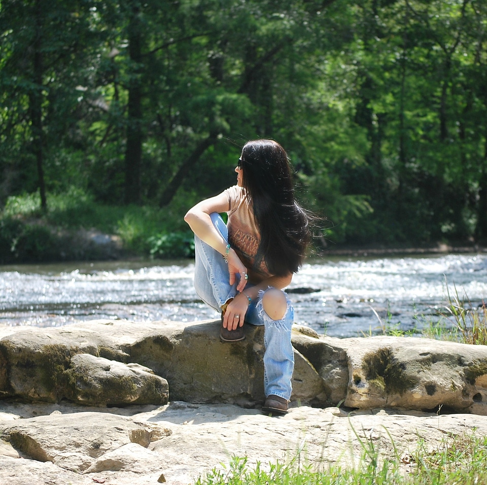 Portrait sitting jeans