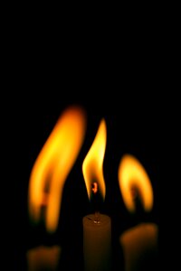 Flammable dark candle photo