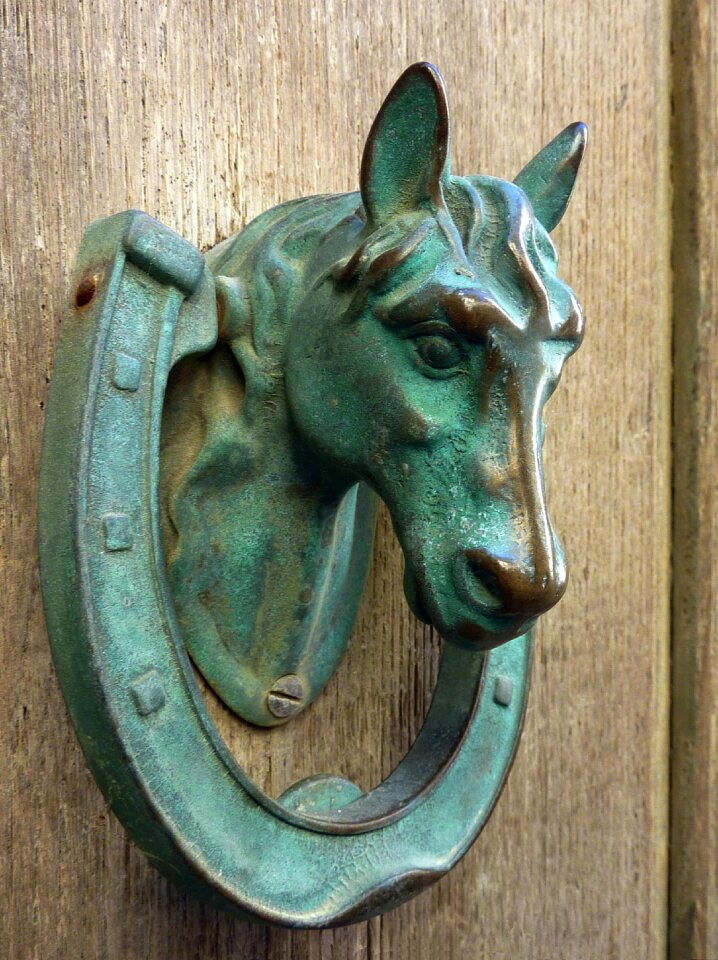 Horse door sculpture