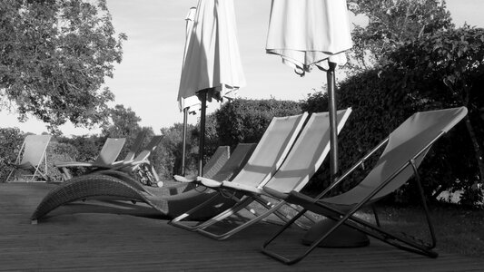 Sun loungers pool sun