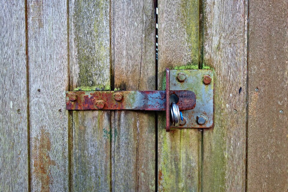 Rusty latch padlock door