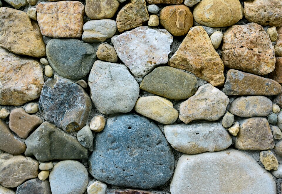 Pebble stone walls background
