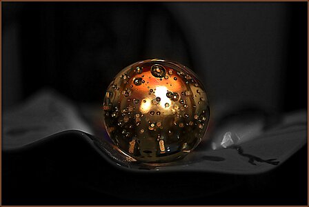 Crystal ball candle light photo