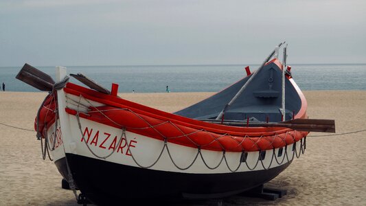 Seaman fishing boat nazareth photo
