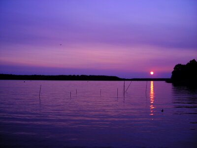 The wave is reflected lake sky photo