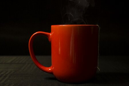 Hot coffee red mug photo