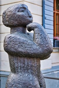 Woman bronze figure photo