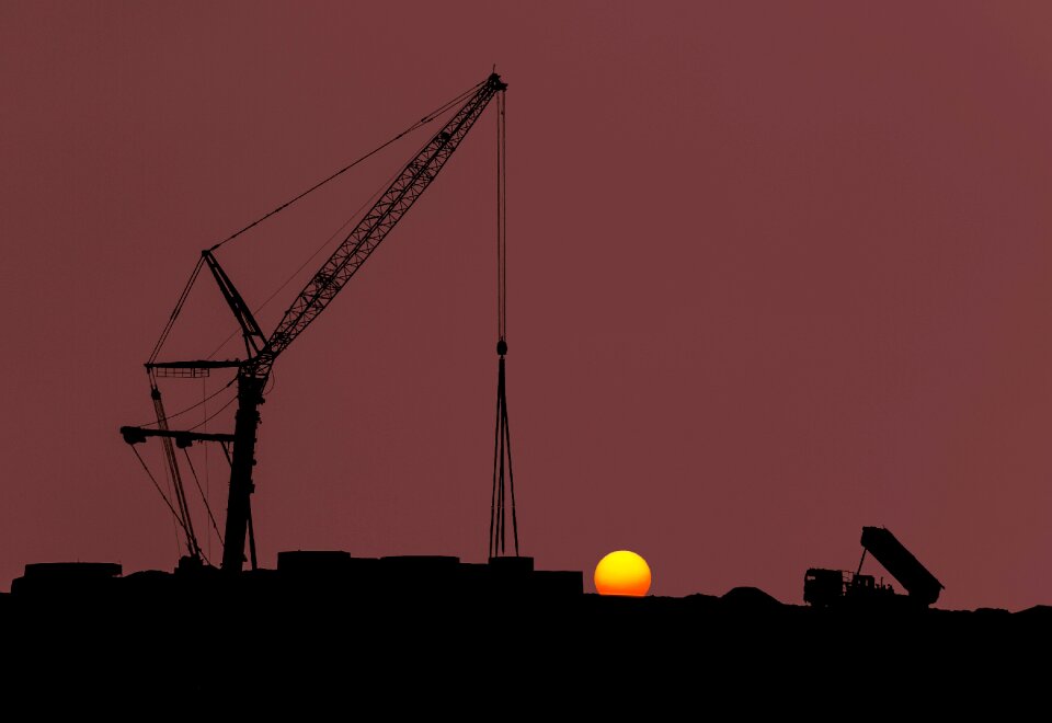 Machine silhouette sunset