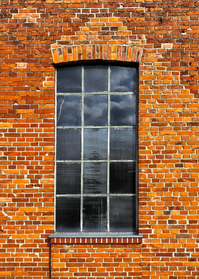 Metal window brick wall old photo