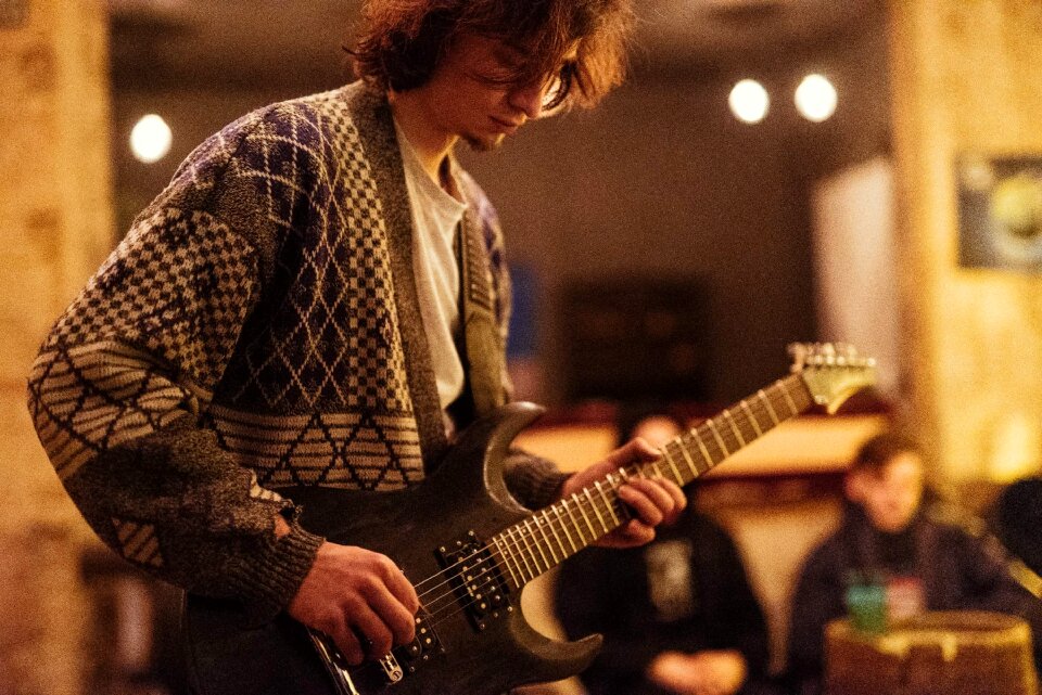 Adult people brown guitar