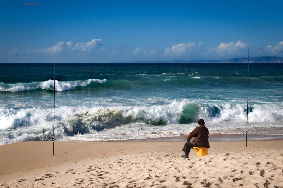 Sea body of water fisherman