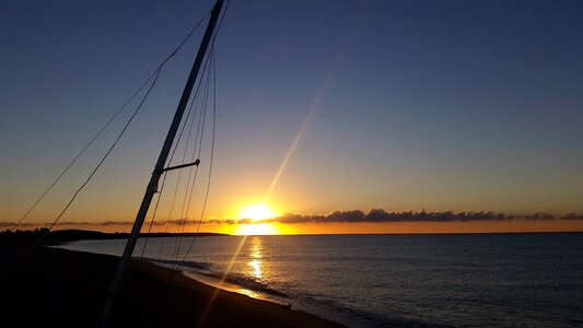 Sea sun sailing boat photo