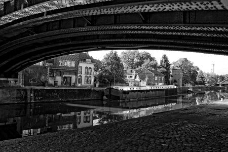 Metal bridge reflection black and white photo