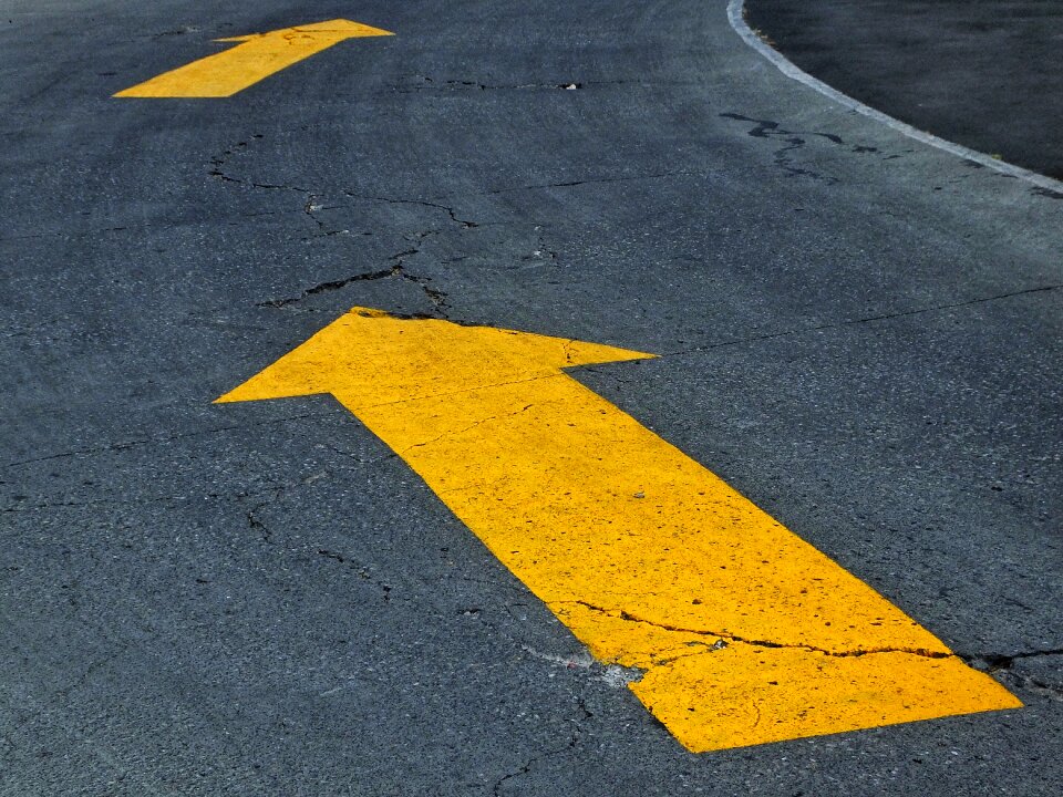 Asphalt road pavement street sign