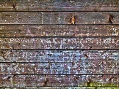 Wooden wall graffiti scratches photo