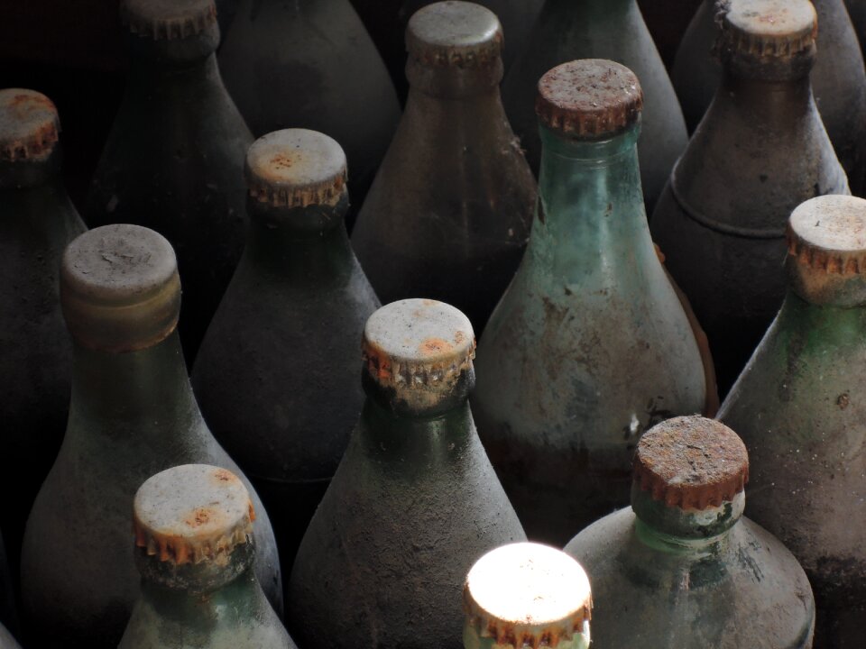 Dirty rusty glass bottle