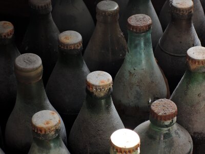 Dirty rusty glass bottle photo