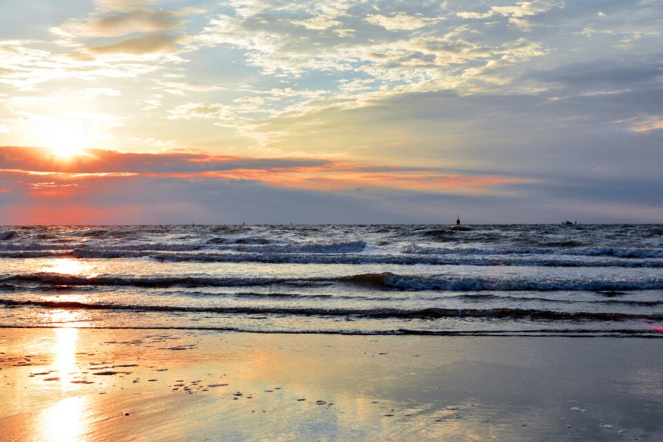 Body of water dawn sun