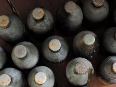 Dirty rusty glass bottle