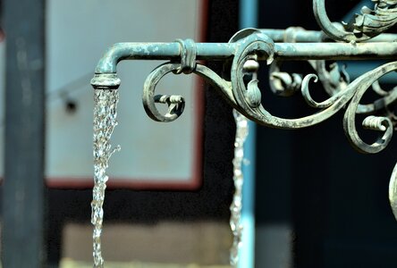 Well water water fountain gargoyle photo