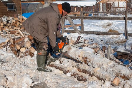 Irkutsk woodcutter chainsaw photo