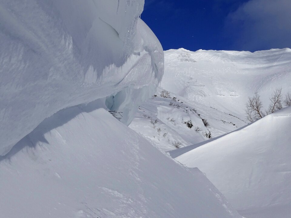 Snow cornices silt wind