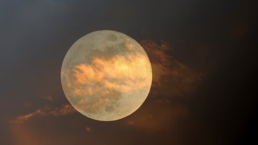 Clouds the fullness of super moon photo