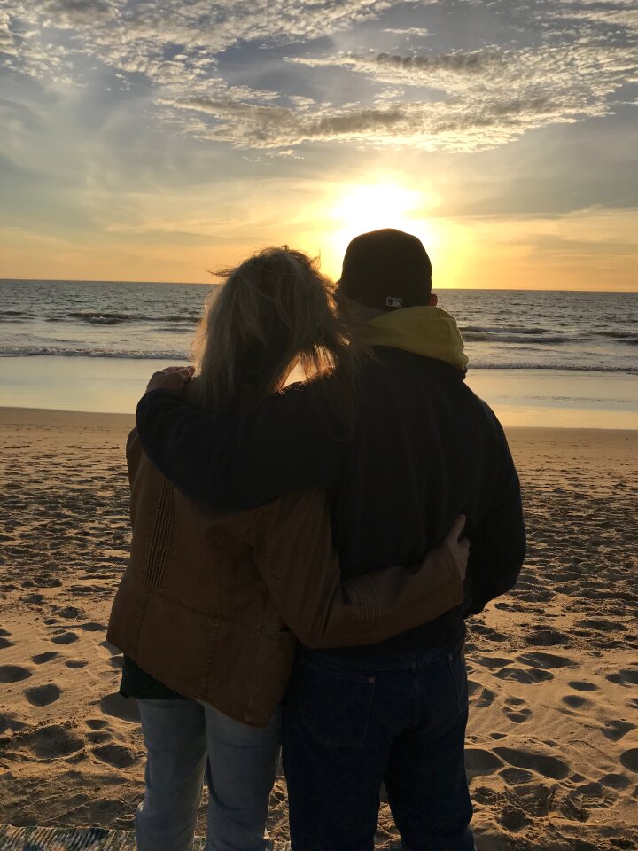 Seashore sunset togetherness