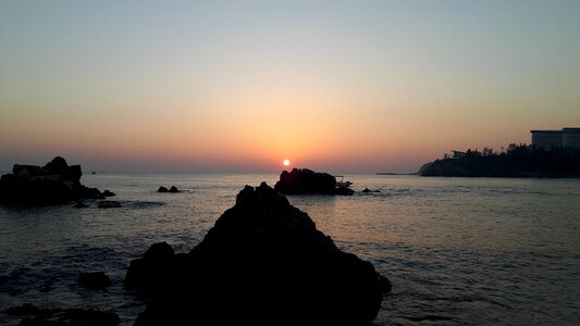 Sunrise dawn the body of water