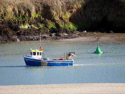 Boat beach fishing photo