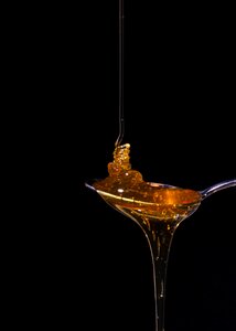 Healthy honey drops spoon