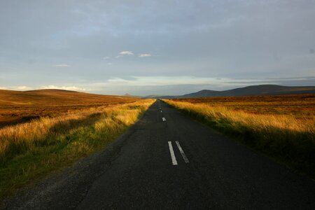 Panoramic field roadtrip leaving photo