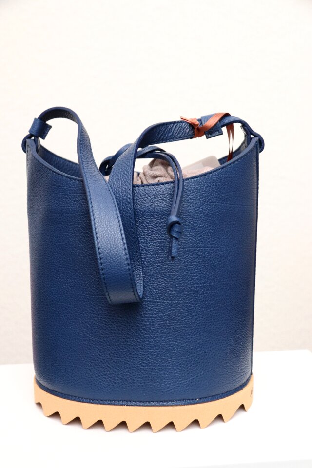 Leather container fashion accessory