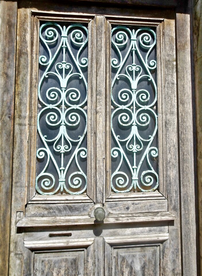 Wrought iron entrance wooden