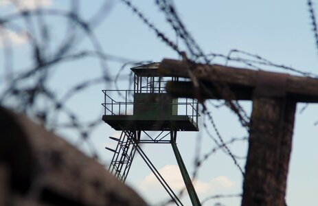 Barbed wire guard tower photo
