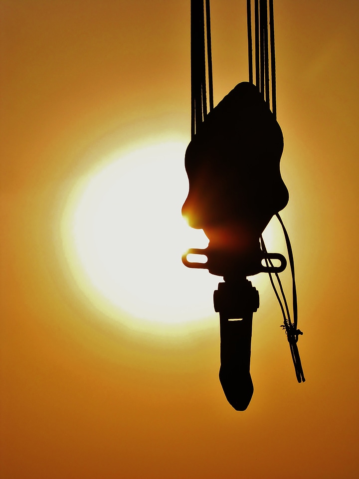 Silhouette sunset construction