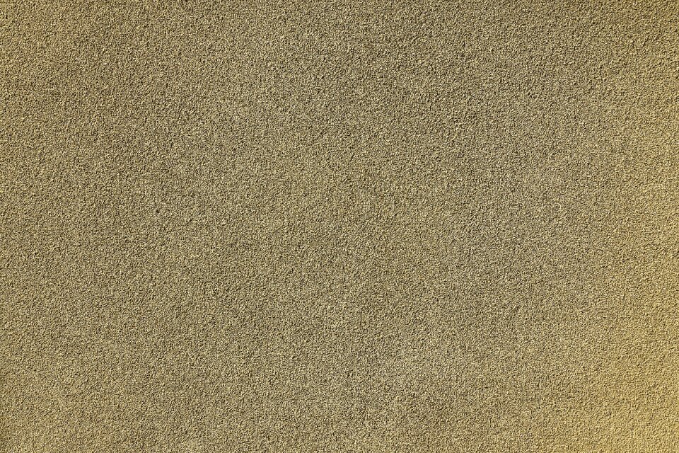 Scratch plaster textured plaster wall