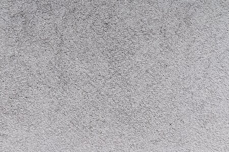 Scratch plaster textured plaster wall photo