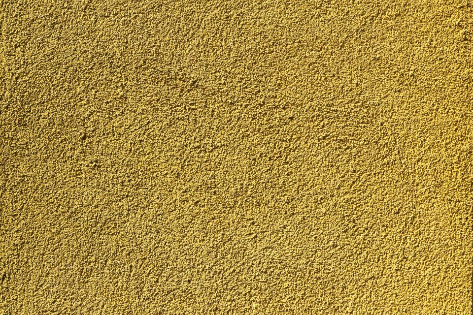Scratch plaster textured plaster wall