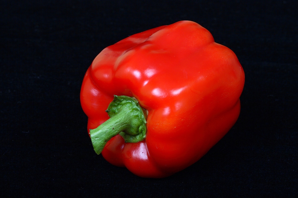 Red sweet pepper black vegetables