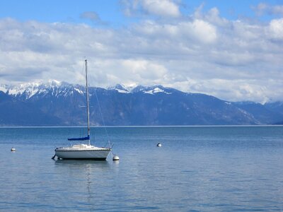 Lake geneva mountains sailboat photo