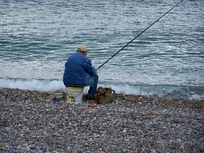 Fisherman rod fishing rod photo