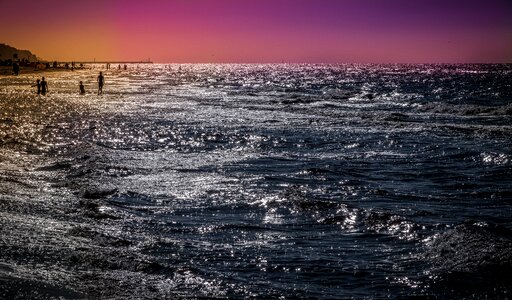 The waves water sunset photo
