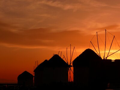 Backlit dusk windmill photo